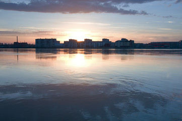 Panorama of city, sunset and river