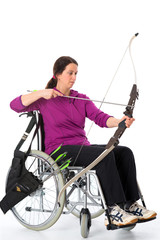 woman in wheelchair shuting bow