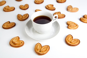 cup of tea with cookies in the shape of hearts 2