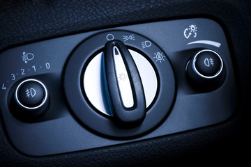 Headlights switch in a car.