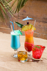 Fresh tropical cocktail on sunny beach