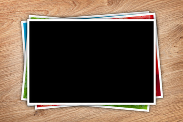 Stack of printed pictures collage