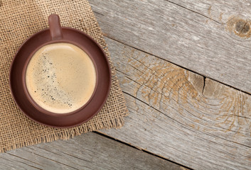 Coffee cup on wooden table