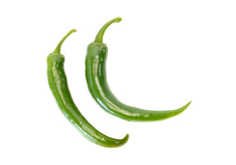 Two fresh green chile pepper