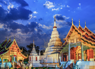 Fototapeta premium Phra Singh temple twilight time Viharn Lai Kam Wat Phra Singh