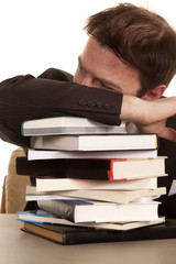Man suit books head down