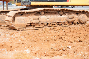 heavy construction equipment moving dirt