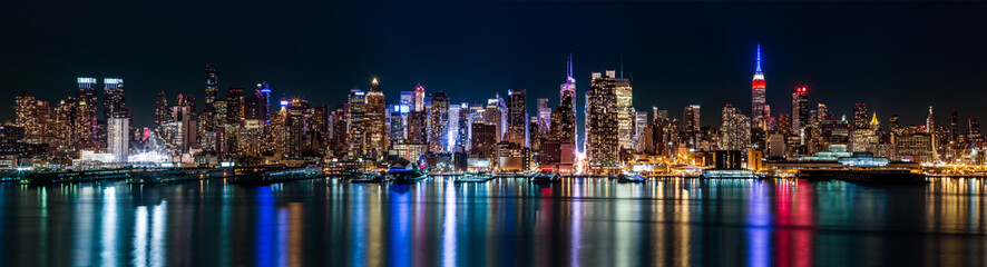 New York midtown panorama by night - obrazy, fototapety, plakaty