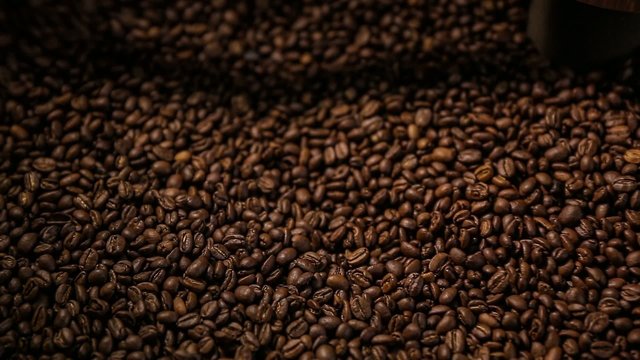 Mixing roasted coffee