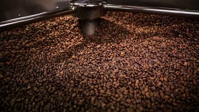 Mixing roasted coffee