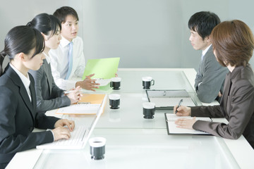 man and woman in meeting