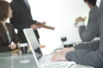 businessman and business woman in meeting