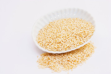 sesame seeds on a white background.
