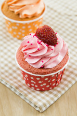Tasty cupcake with butter cream