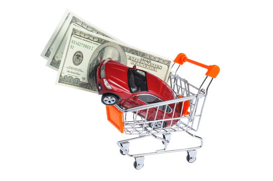 Toy Car With Money In Shopping Cart Isolated On White