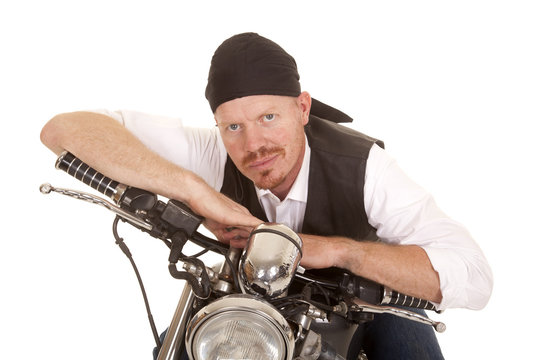 Man bandana motorcycle arms on handlebars