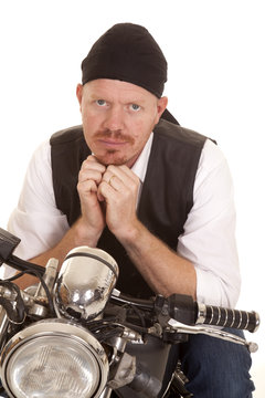 Man bandana motorcycle hands under chin