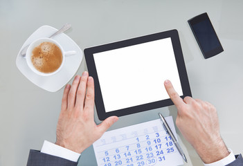 Businessperson With Digital Tablet And Calendar