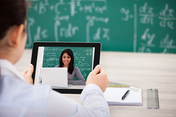 Woman Having Videochat With Digital Tablet