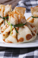 Pancake bag with stuffing on the table vertical closeup