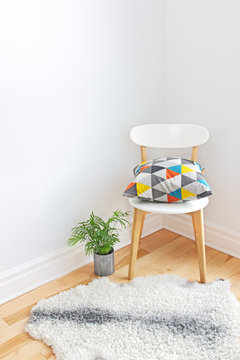 Chair with bright cushion and sheepskin rug on the floor
