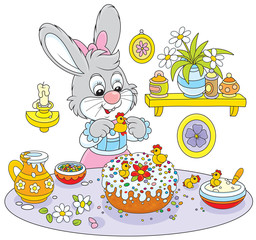 Easter rabbit decorating a fancy cake
