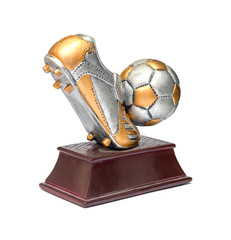 Prize in the form of shoes and a soccer ball on a stand