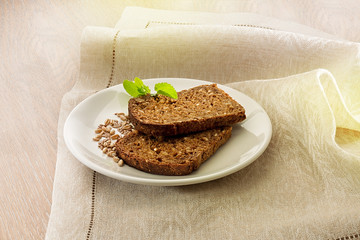 Two slices of brown bread