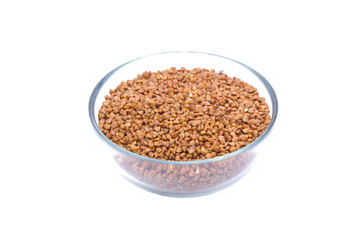 Buckwheat in glass jar macro close up