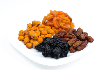 Heaps of dried fruits: prunes, dates, apricots