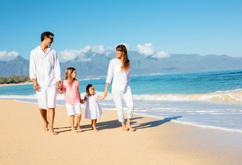 Family walking on the beach