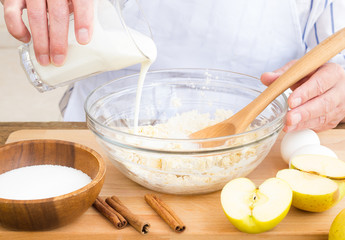 Man preparing an apple pie
