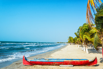 Beach and Red Canoe