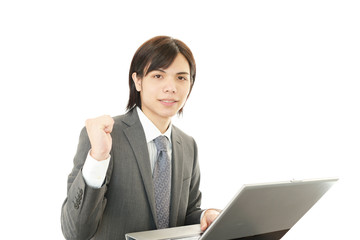 ガッツポーズのビジネスマン