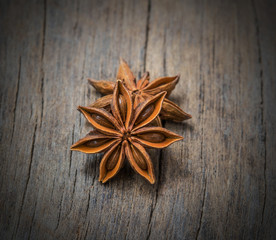 Anise stars heap on the wooden