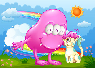 A pink monster and a cat at the hilltop with a rainbow in the sk