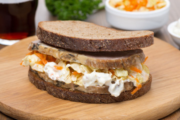 sandwich with coleslaw and meat