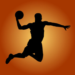 Fototapeta na wymiar Basketball player jumping silhouette