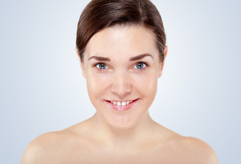 Portrait of Beautiful Young Woman posing in studio