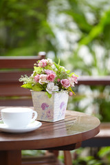 rose decoration on  wooden table