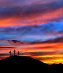 Easter sunset sky with crosses - religious Christian background