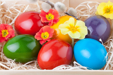 Colorful Easter Eggs in a Wooden Box in Closeup