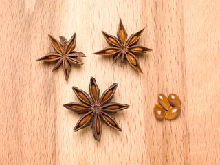 Star anise on a wooden background