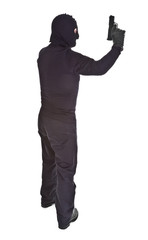 Profile of thief with gun