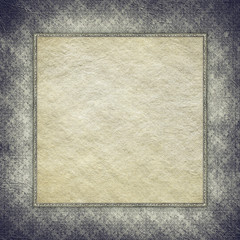 Blank paper sheet in picture frame on grunge background