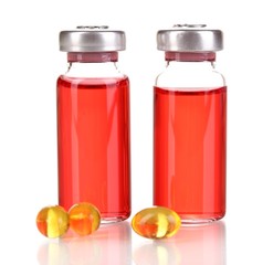 Tablets and ampoules isolated on white