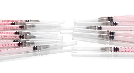 Insulin syringes isolated on white
