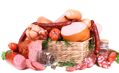 Lot of different sausages in basket isolated on white