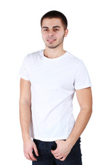 Fototapeta premium Przystojny młody mężczyzna na jasnym tle