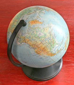 globe on wooden table